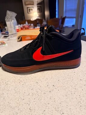 Nike Men’s Black Sneakers with Red Swoosh and Brown Accents